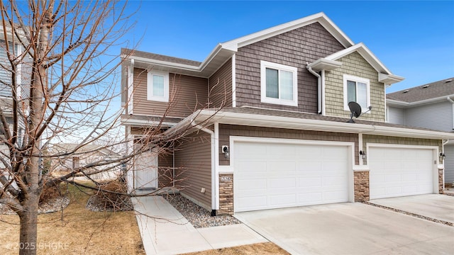 view of front of house featuring driveway and an attached garage