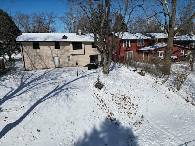 view of yard layered in snow