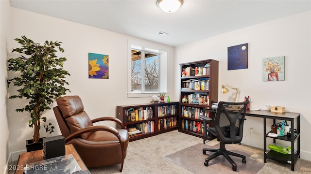 carpeted office space with visible vents