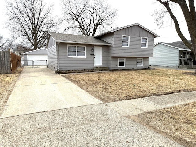 split level home with an outbuilding and a garage