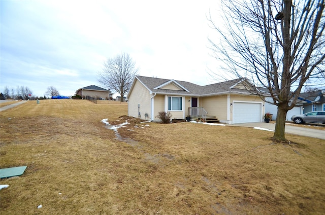 ranch-style house with a front yard, driveway, and an attached garage