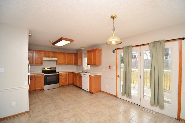 kitchen featuring pendant lighting, stainless steel electric stove, light countertops, white dishwasher, and under cabinet range hood