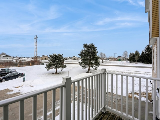 view of snow covered deck