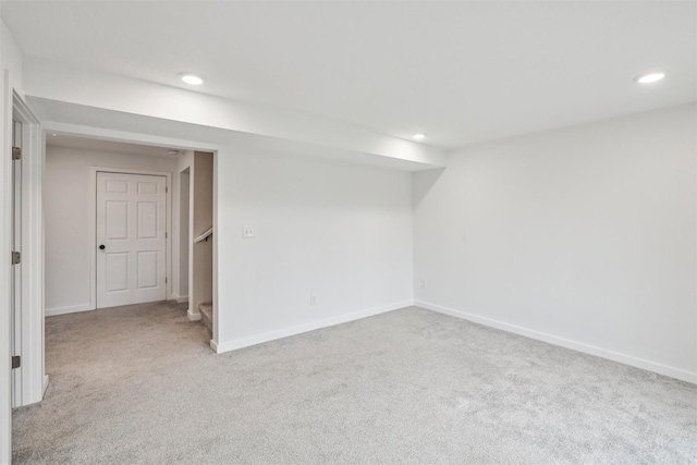 basement with light colored carpet