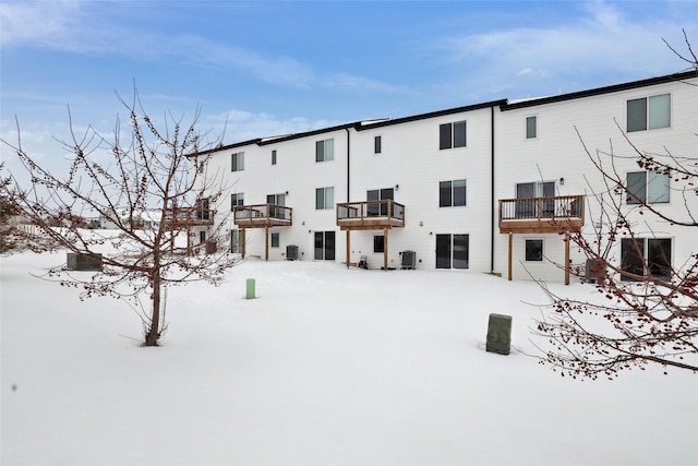 view of snow covered property