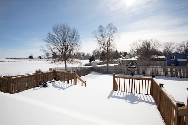 view of snow covered deck