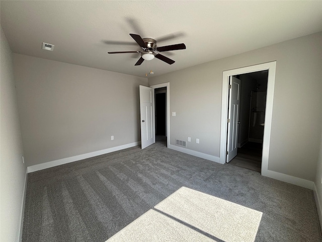 1715 Gordon Ct, Norwalk, IA 50211 - unfurnished bedroom with carpet flooring, baseboards, ensuite bathroom, and a ceiling fan