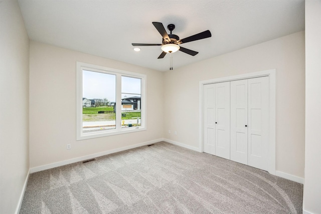 18258 Hidden Knl, Clive, IA 50325 - unfurnished bedroom with carpet, baseboards, and a closet