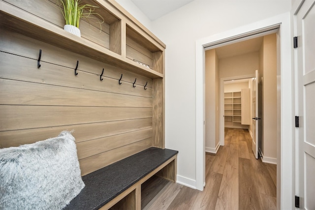 18258 Hidden Knl, Clive, IA 50325 - mudroom featuring wood finished floors and baseboards