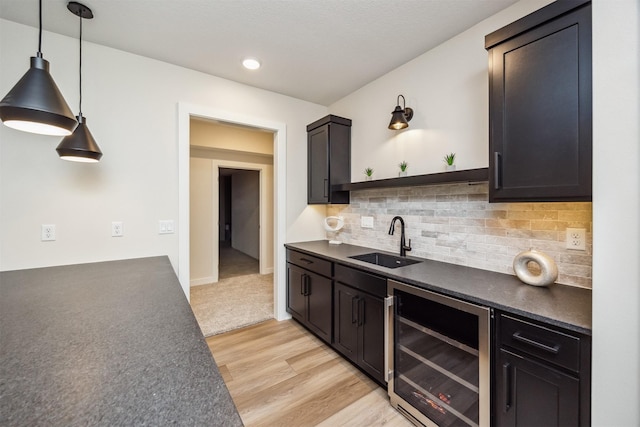 18258 Hidden Knl, Clive, IA 50325 - kitchen featuring a sink, wine cooler, dark countertops, open shelves, and backsplash