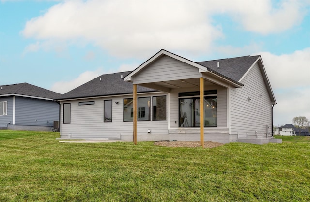 18258 Hidden Knl, Clive, IA 50325 - rear view of house featuring a yard and roof with shingles