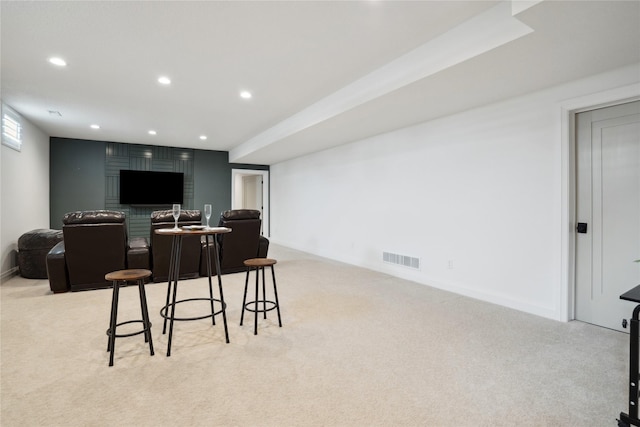 interior space featuring light colored carpet