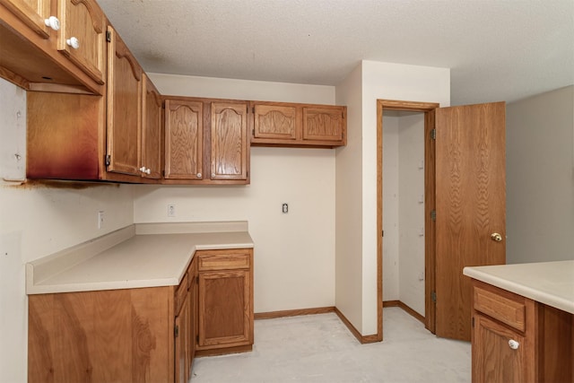 kitchen with a textured ceiling