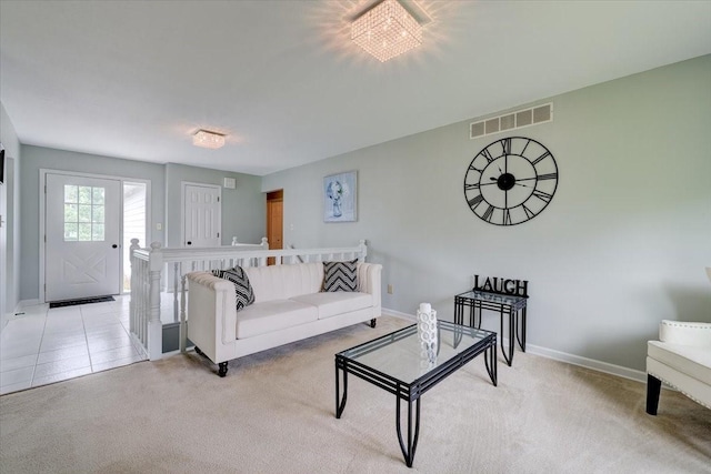 living room featuring light carpet