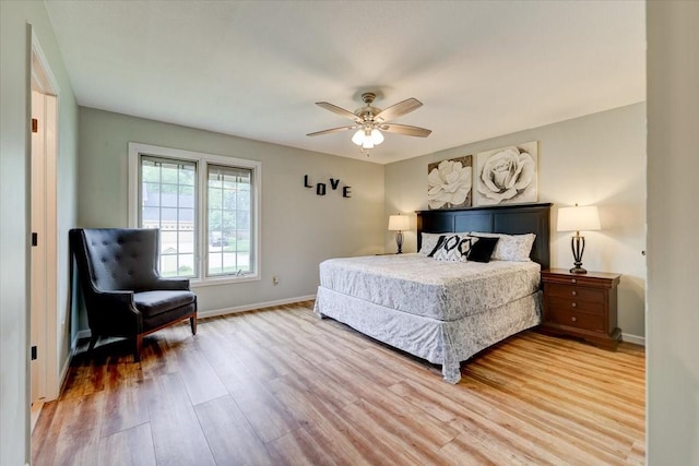 bedroom featuring hardwood / wood-style floors and ceiling fan