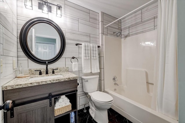 full bathroom featuring tile walls, shower / bath combination with curtain, vanity, and toilet