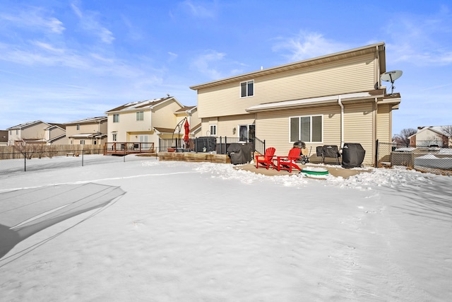 view of snow covered house