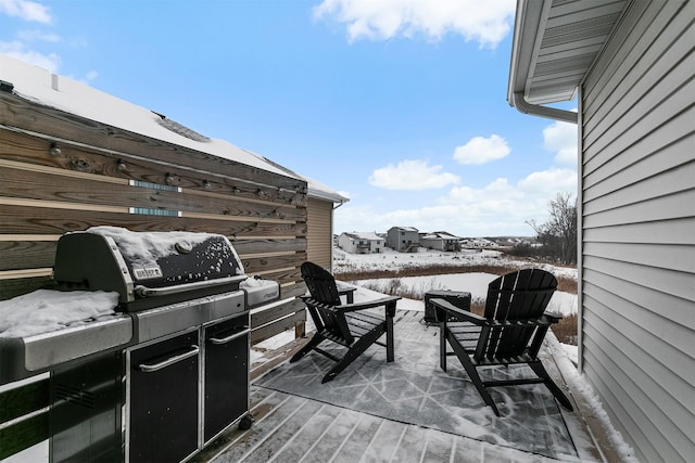 view of snow covered deck