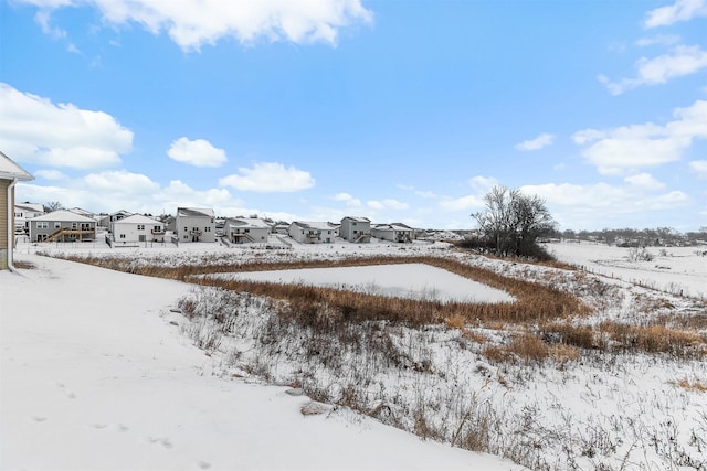 view of snowy yard