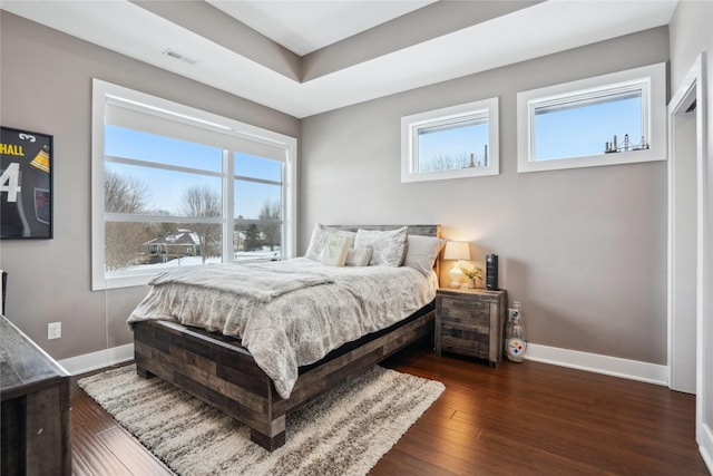 bedroom featuring dark hardwood / wood-style floors