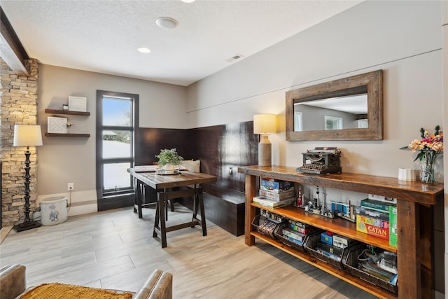 interior space featuring a textured ceiling