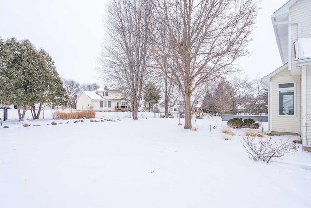 view of yard layered in snow