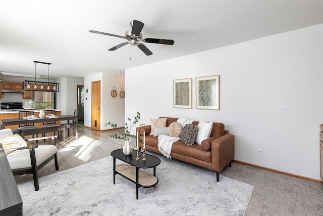 living room featuring ceiling fan