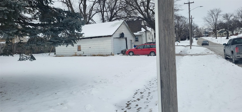 view of yard covered in snow