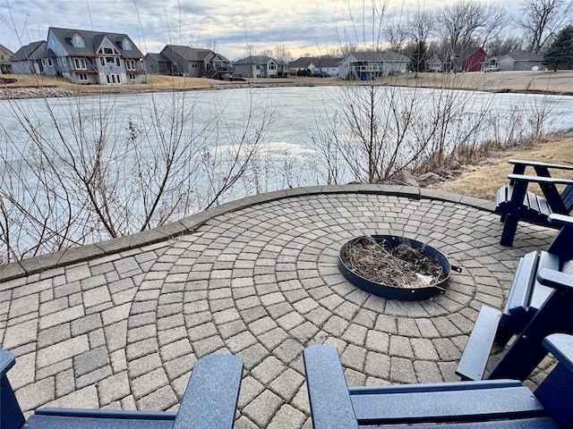 exterior space with an outdoor fire pit