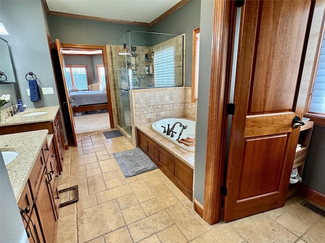 bathroom with separate shower and tub, vanity, and crown molding