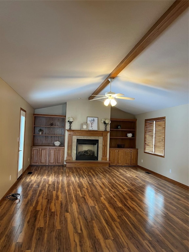 unfurnished living room featuring vaulted ceiling with beams, dark hardwood / wood-style floors, and ceiling fan