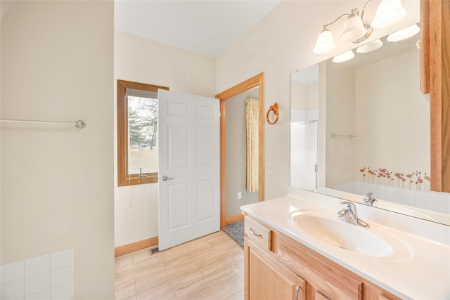 bathroom with vanity and walk in shower