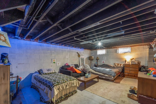 bedroom featuring concrete floors