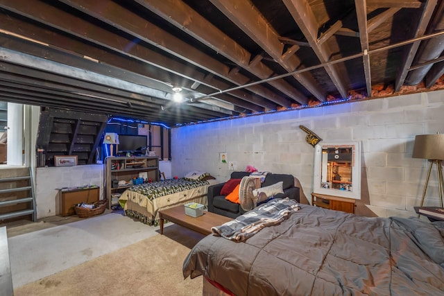 bedroom featuring concrete flooring