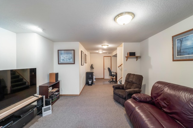 living room with light carpet and a textured ceiling