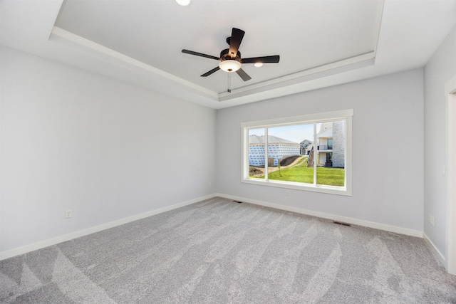 18274 Hidden Knl, Clive, IA 50325 - carpeted empty room with a raised ceiling, ceiling fan, and baseboards