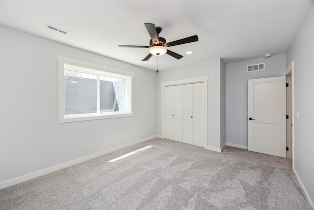 18274 Hidden Knl, Clive, IA 50325 - unfurnished bedroom with a closet, light colored carpet, baseboards, and recessed lighting