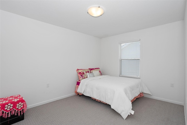 carpeted bedroom with baseboards