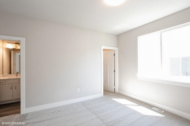 1020 2nd St NE, Altoona, IA 50009 - unfurnished bedroom with carpet flooring and ensuite bath