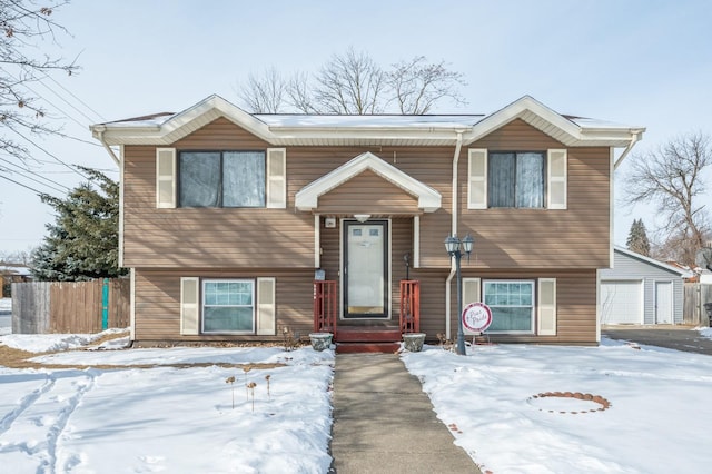 split foyer home featuring a detached garage