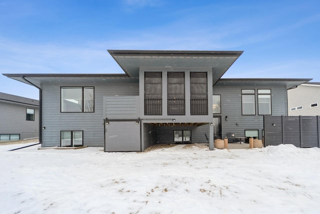 view of snow covered house