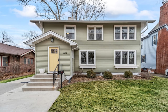 view of front of house with a front yard