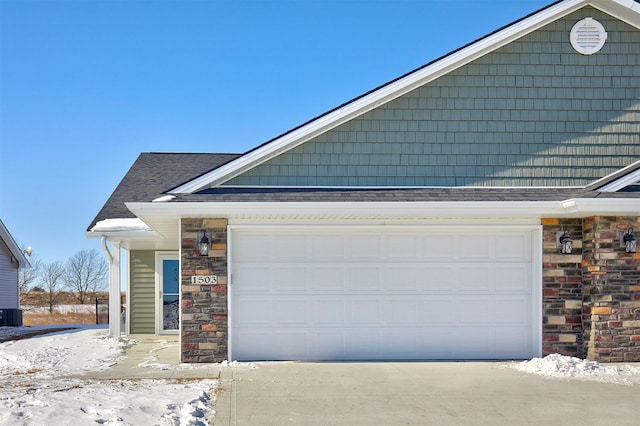 view of front of property with roof with shingles