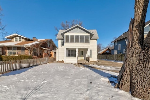 view of front of house with fence