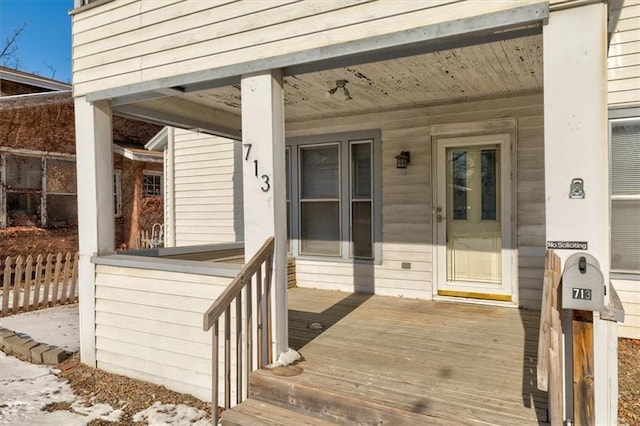 entrance to property with a porch