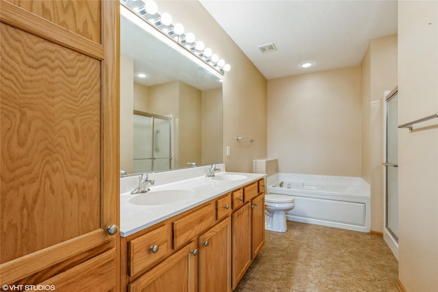 full bathroom with visible vents, a sink, a garden tub, and double vanity