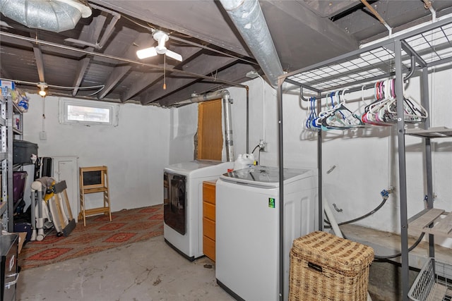 washroom featuring laundry area and washing machine and clothes dryer