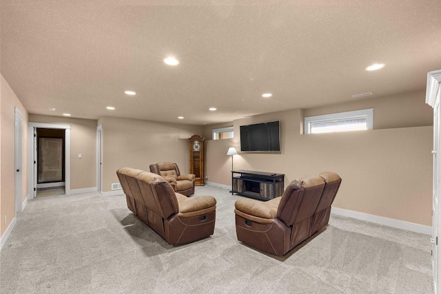 living room with light carpet, baseboards, and recessed lighting