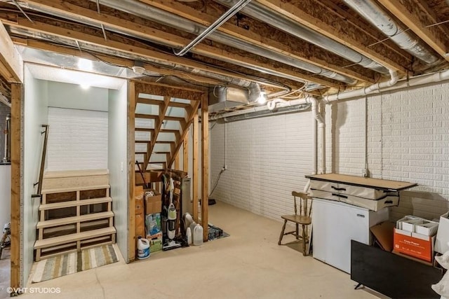unfinished basement with brick wall