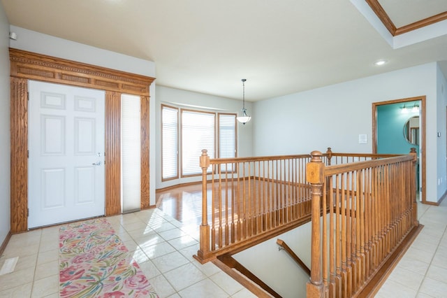 interior space with light tile patterned floors, crown molding, recessed lighting, and baseboards